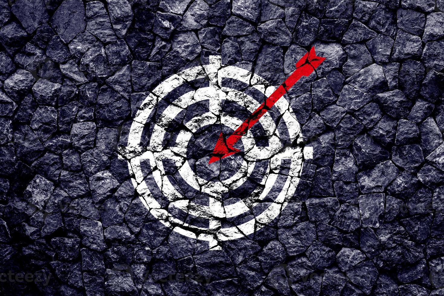 Target figure on broken wall, concept of achieving goal quality, Aim Target Red Symbols of goals and objectives over grunge background. business idea photo