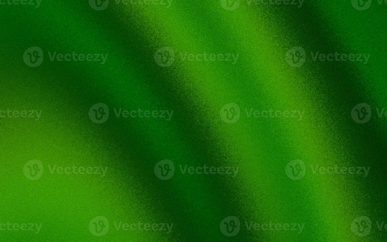 Attractive green gradient background with noise or grain textures. Green grunge texture background. Blurred gradient background. Sprayed gradient with the grain or noise effects. photo