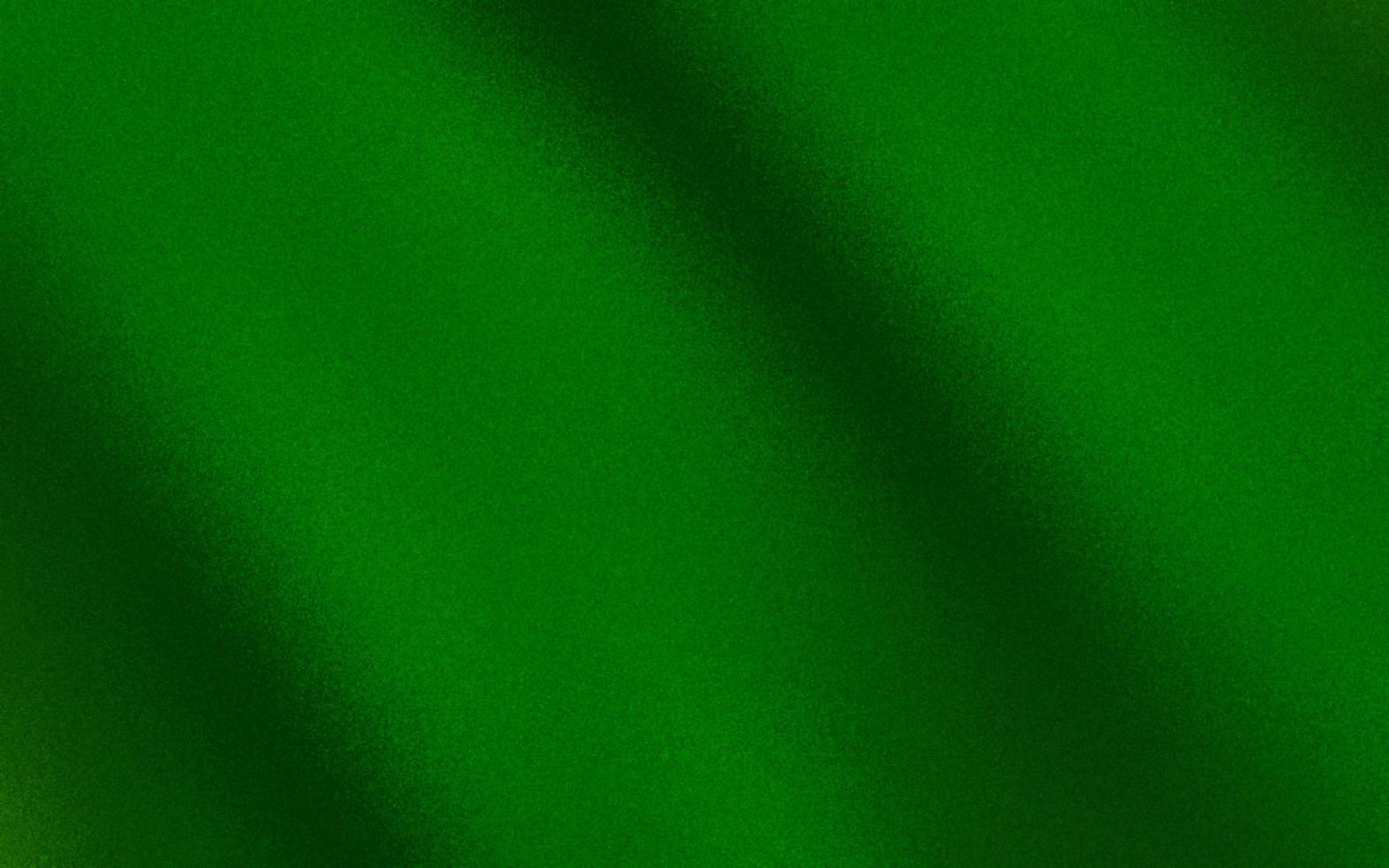 Attractive green gradient background with noise or grain textures. Green grunge texture background. Blurred gradient background. Sprayed gradient with the grain or noise effects. photo