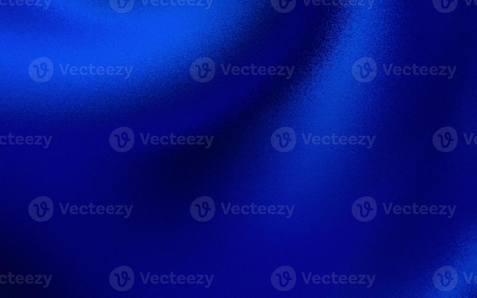 Fashionable blue gradient background with noise or grain textures. Blue grunge texture background. Blurred gradient background. Sprayed gradient with the grain or noise effects. photo