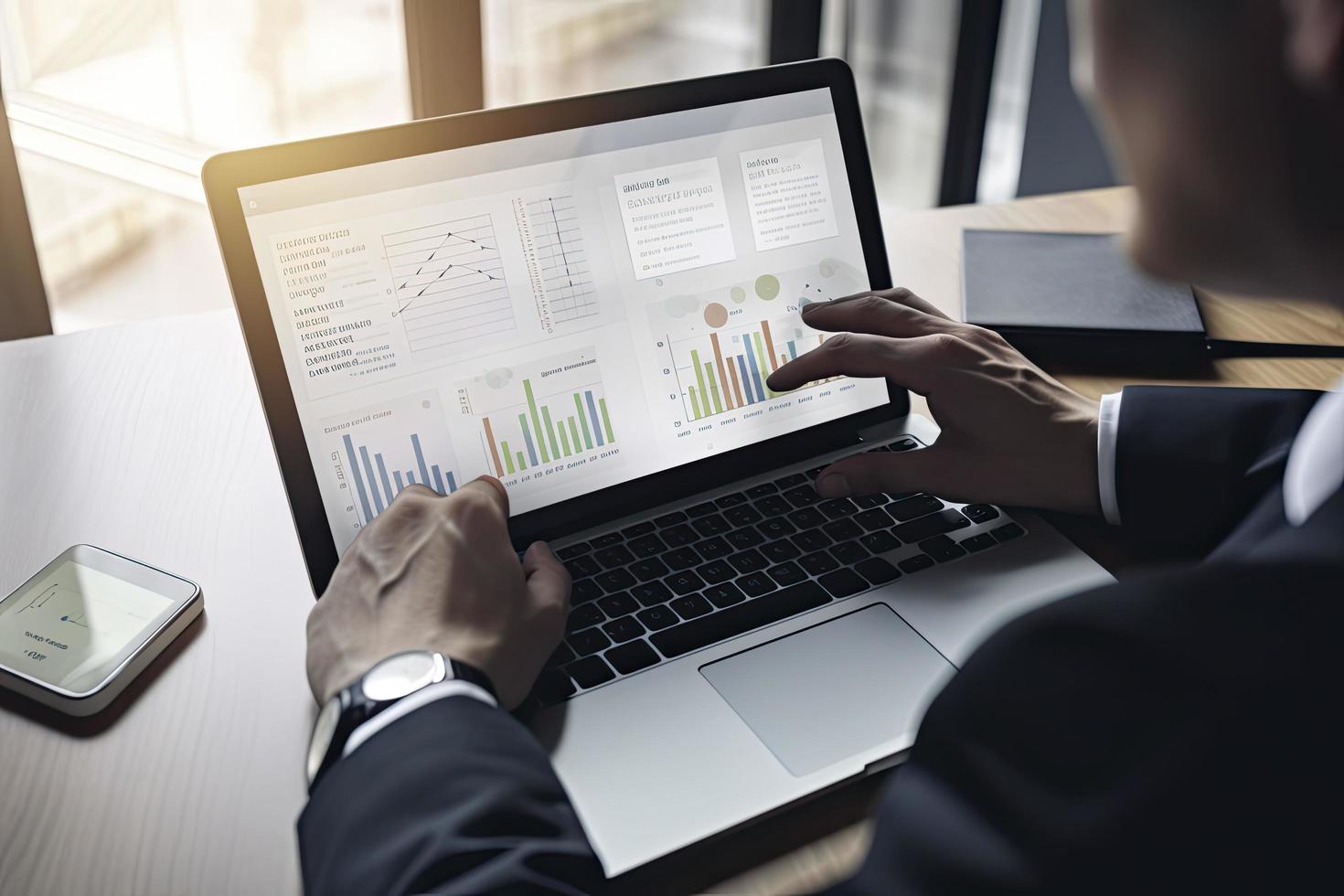 Web analytics and digital marketing. Top view of business man using laptop photo