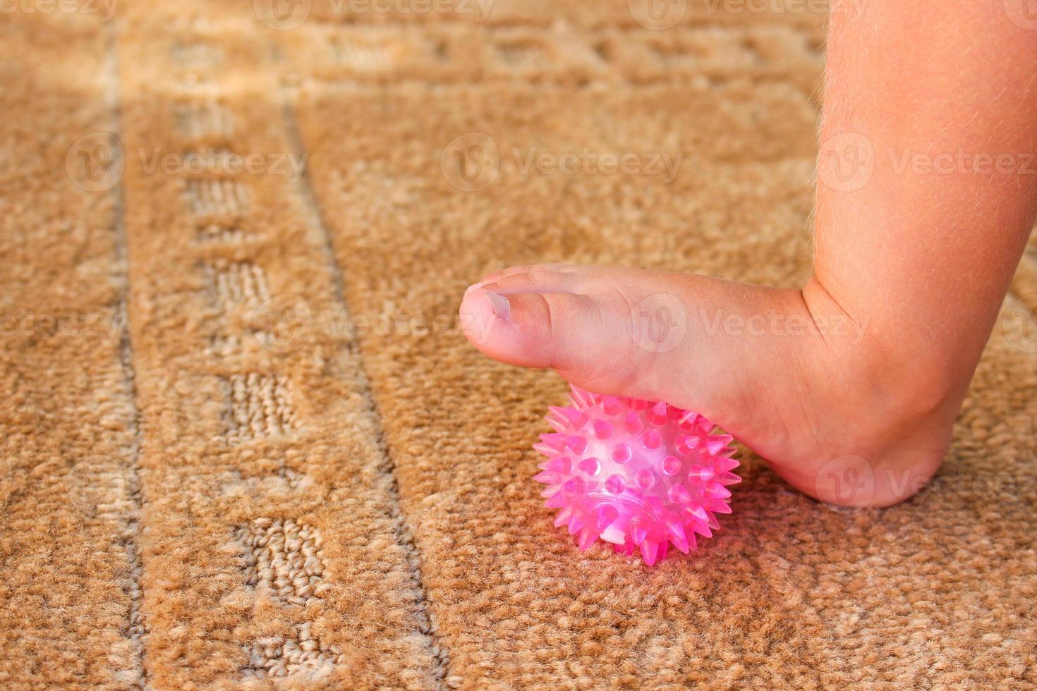 Children does exercise for foot massage ball photo