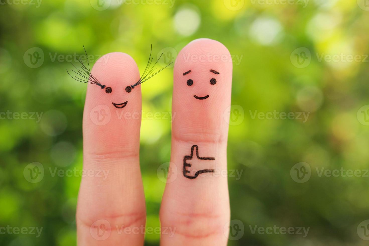 Fingers art of Happy couple. Man likes women's long eyelashes . photo