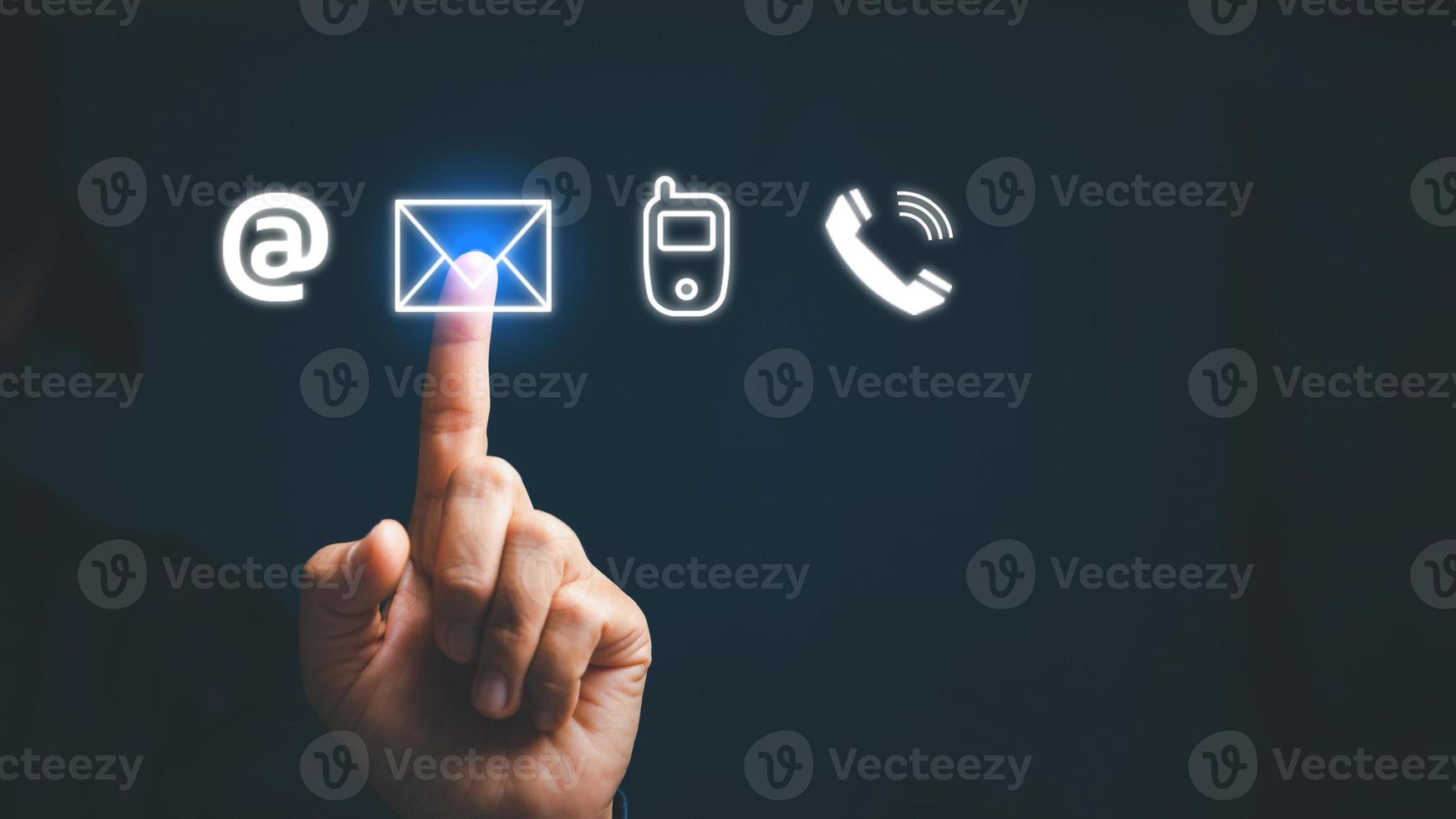 Businesswoman touching on virtual screen contact icons  email, address, live chat, internet wifi  Contact us or Customer support hotline people connect. photo