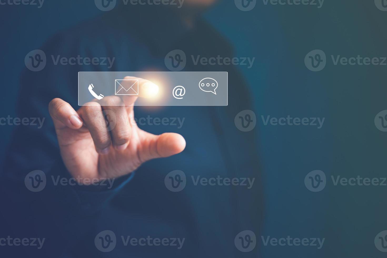 Businesswoman touching on virtual screen contact icons  email, address, live chat, internet wifi  Contact us or Customer support hotline people connect. photo