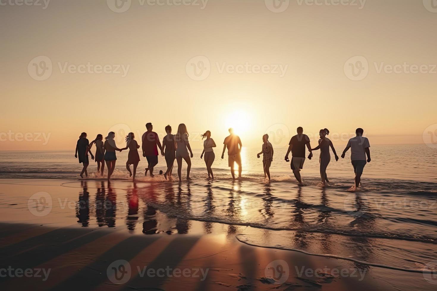 Big group of young friends or big family are having fun and run at sunset beach. Summer vacations concept photo