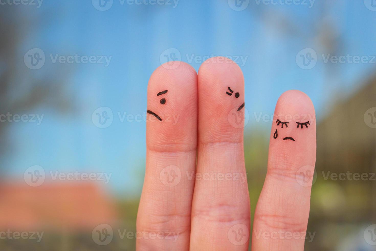Fingers art of couple after an argument looking in different directions. Idea of family during conflict. Concept of parents quarrel, child was upset. photo
