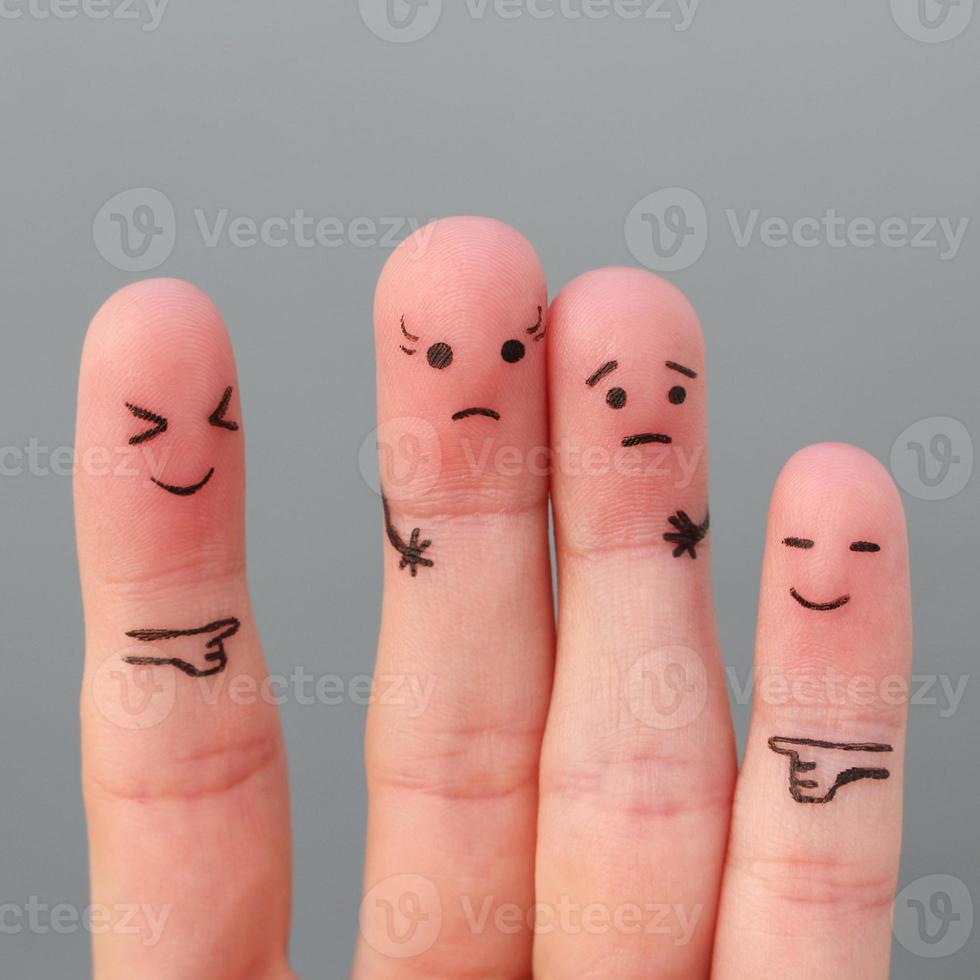 Fingers art of people. Concept woman taller than man, around laugh at them. photo