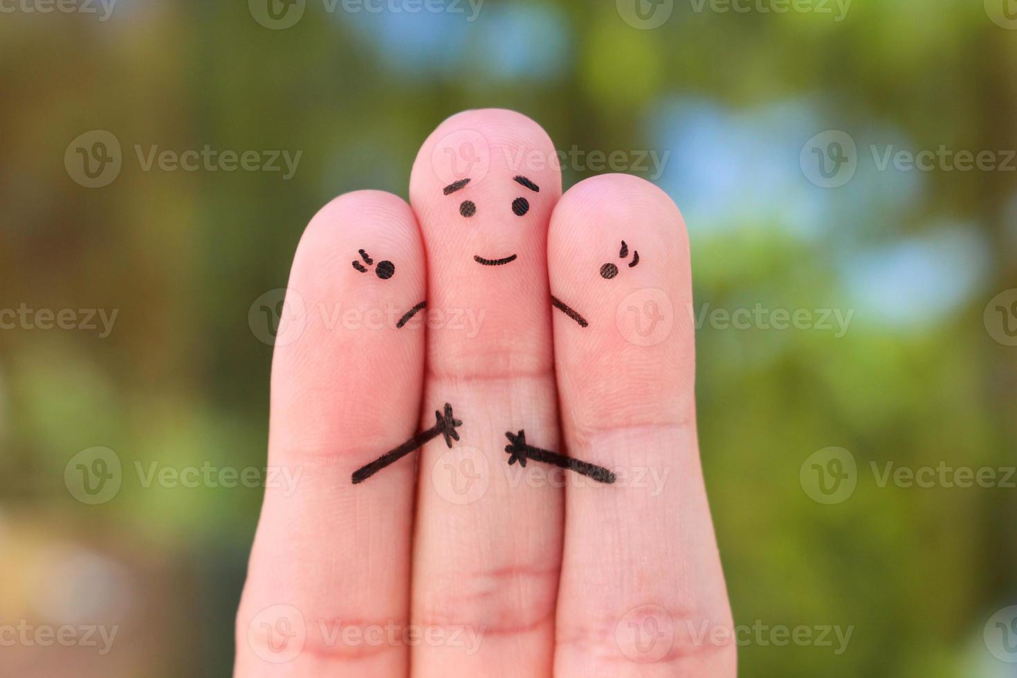 Fingers art. Concept of two women fight over one man. photo