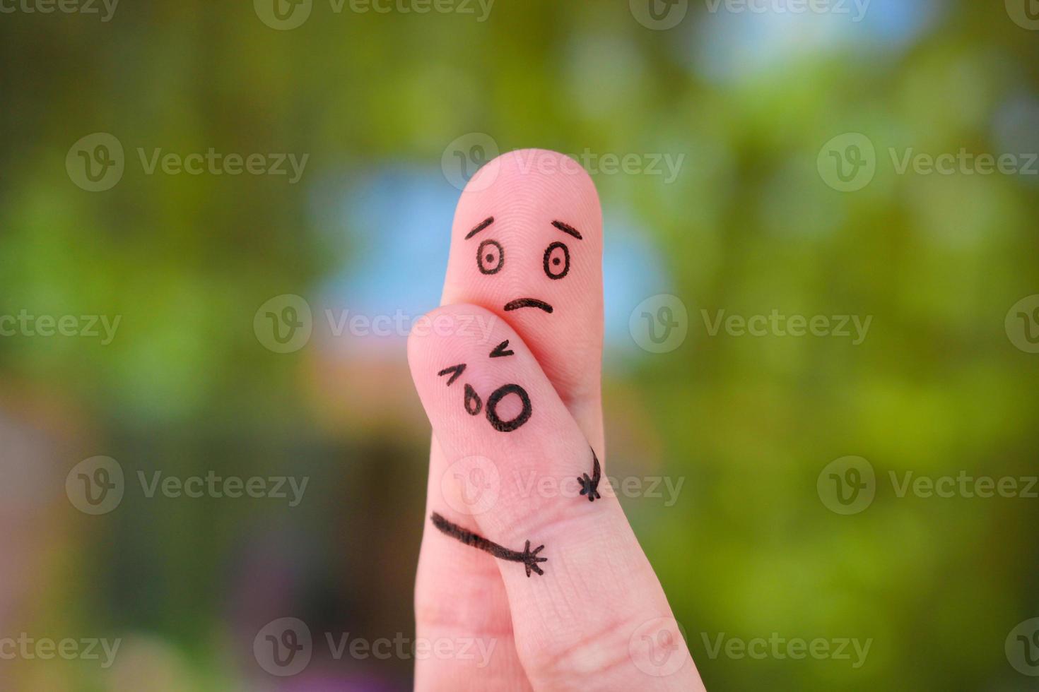 Fingers art of family during quarrel. Concept of child remained with father, baby cries. photo