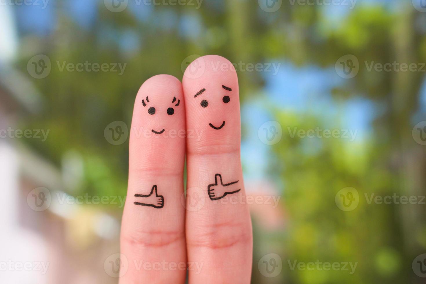 Fingers art of Happy couple showing thumbs up. photo