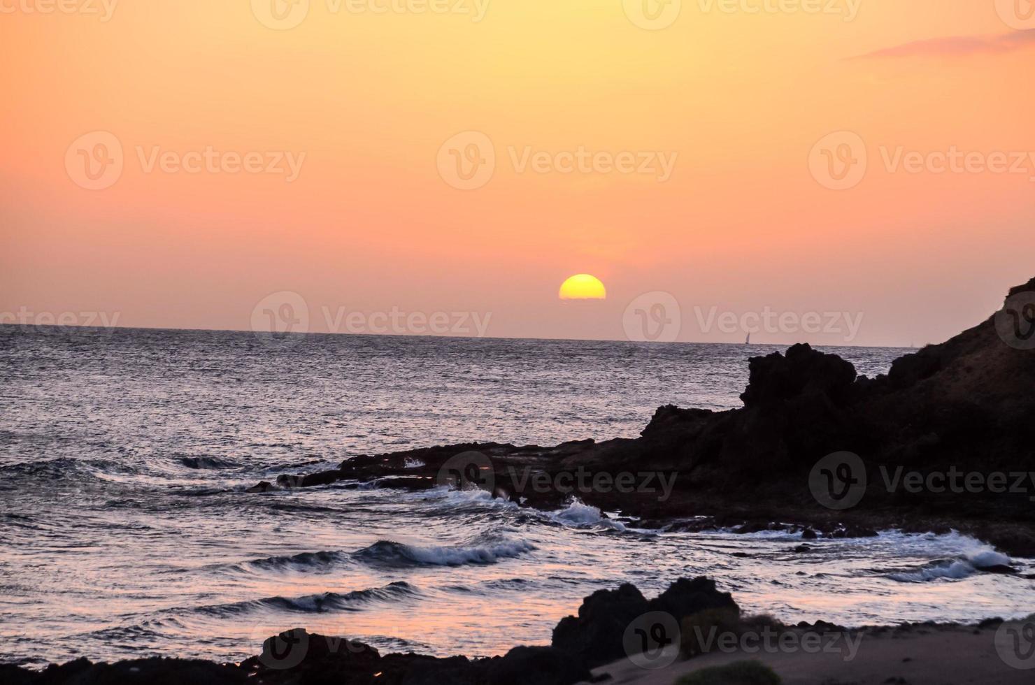 Sunset over the sea photo