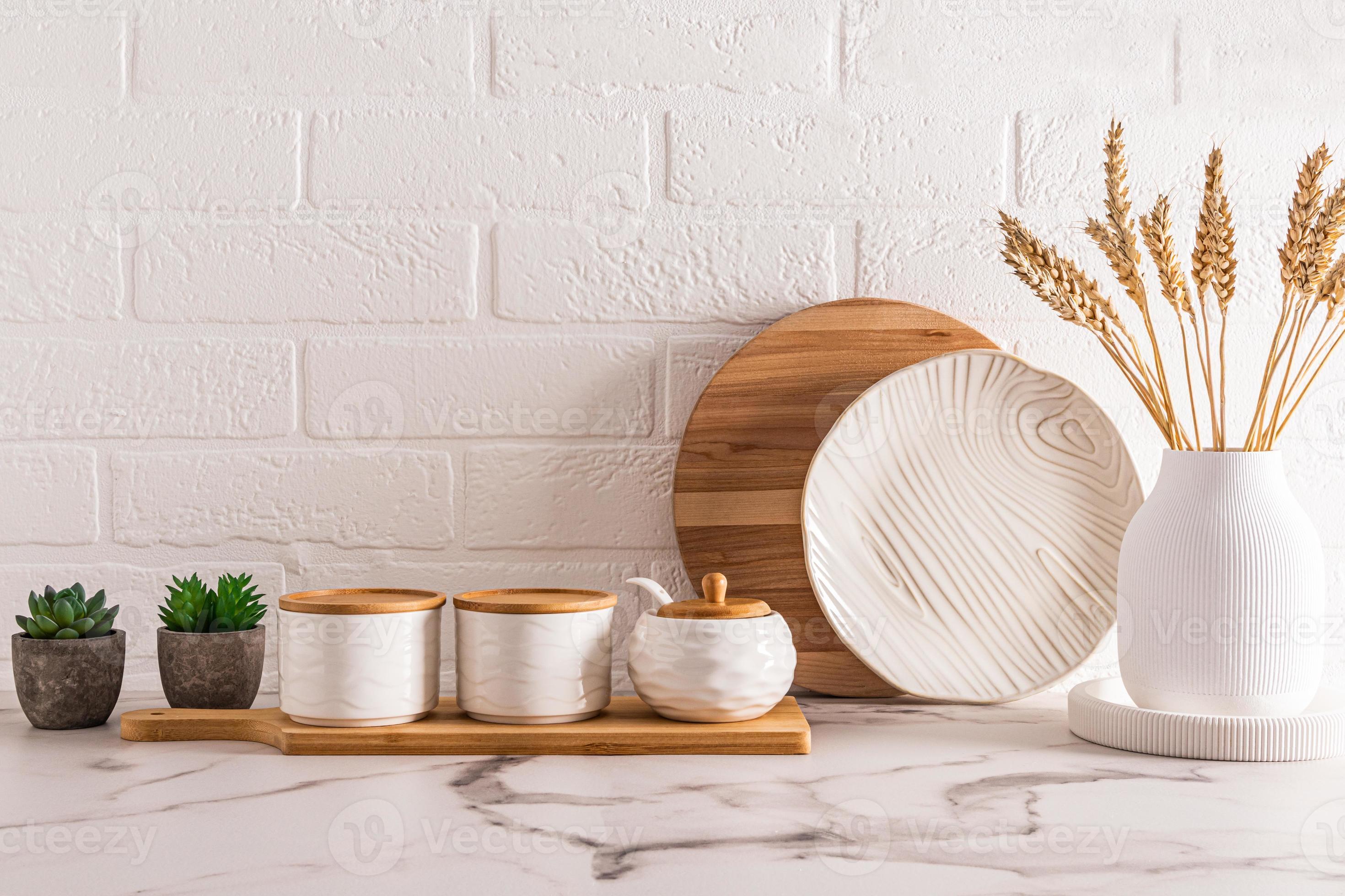 the concept of New Year's decor of a modern kitchen in light colors. front  view of the countertop with kitchen utensils and decorations 13941444 Stock  Photo at Vecteezy