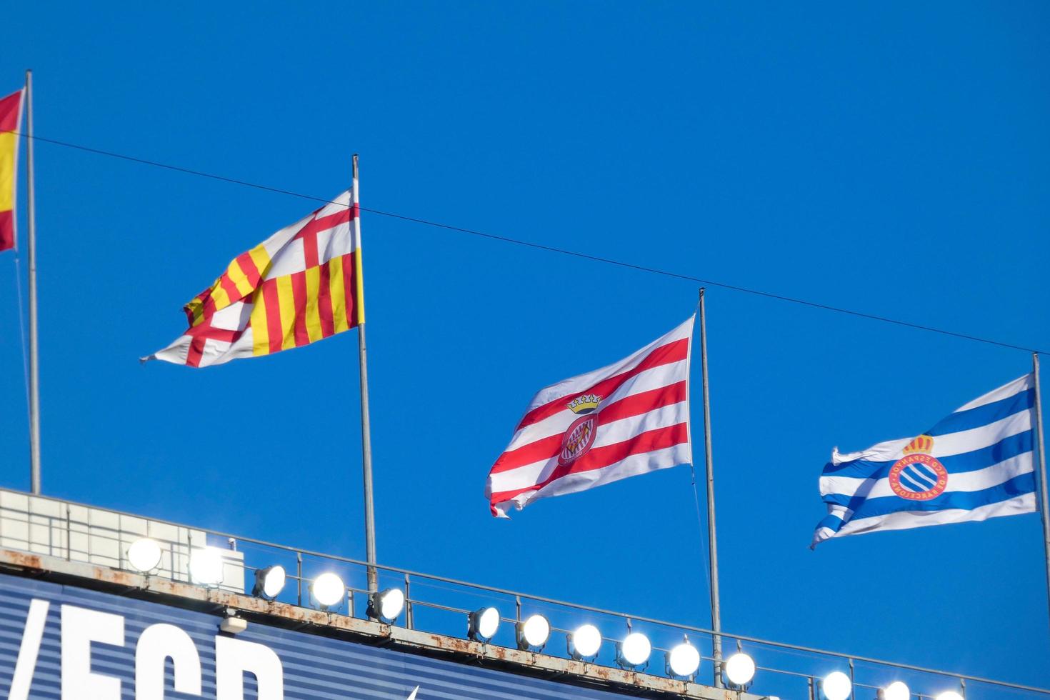 Flags of different countries and sports teams, flags with different coloured stripes. photo