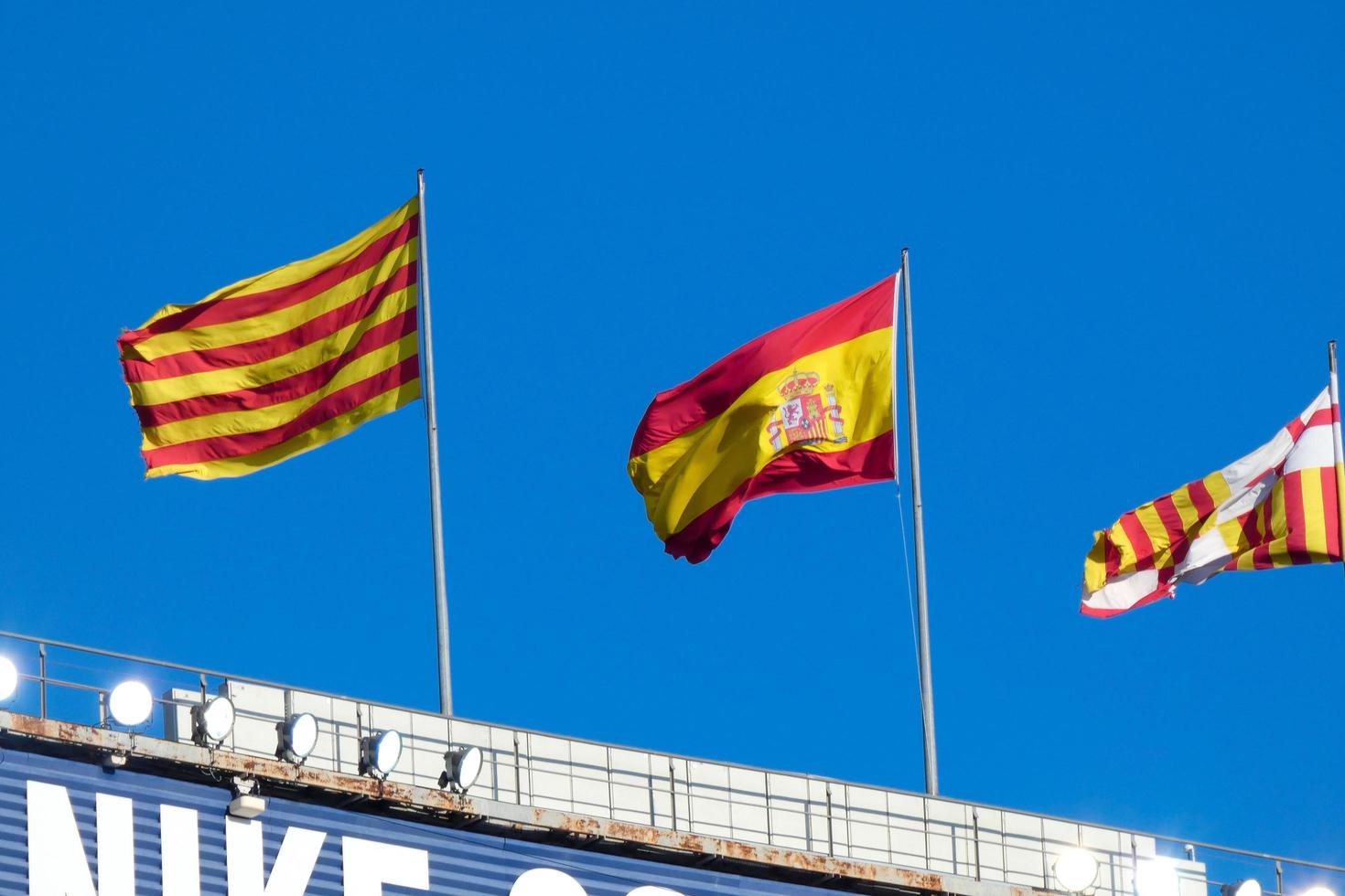 Flags of different countries and sports teams, flags with different coloured stripes. photo