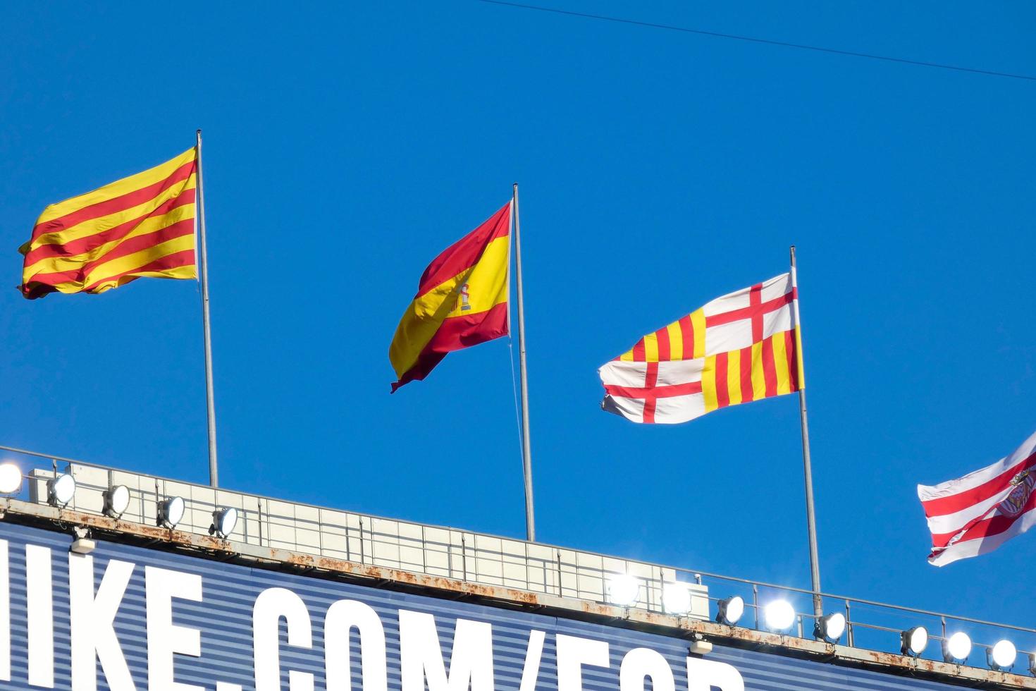 Flags of different countries and sports teams, flags with different coloured stripes. photo