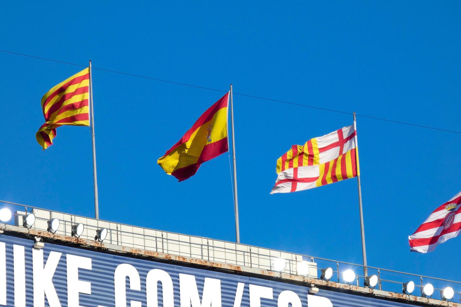 Flags of different countries and sports teams, flags with different coloured stripes. photo