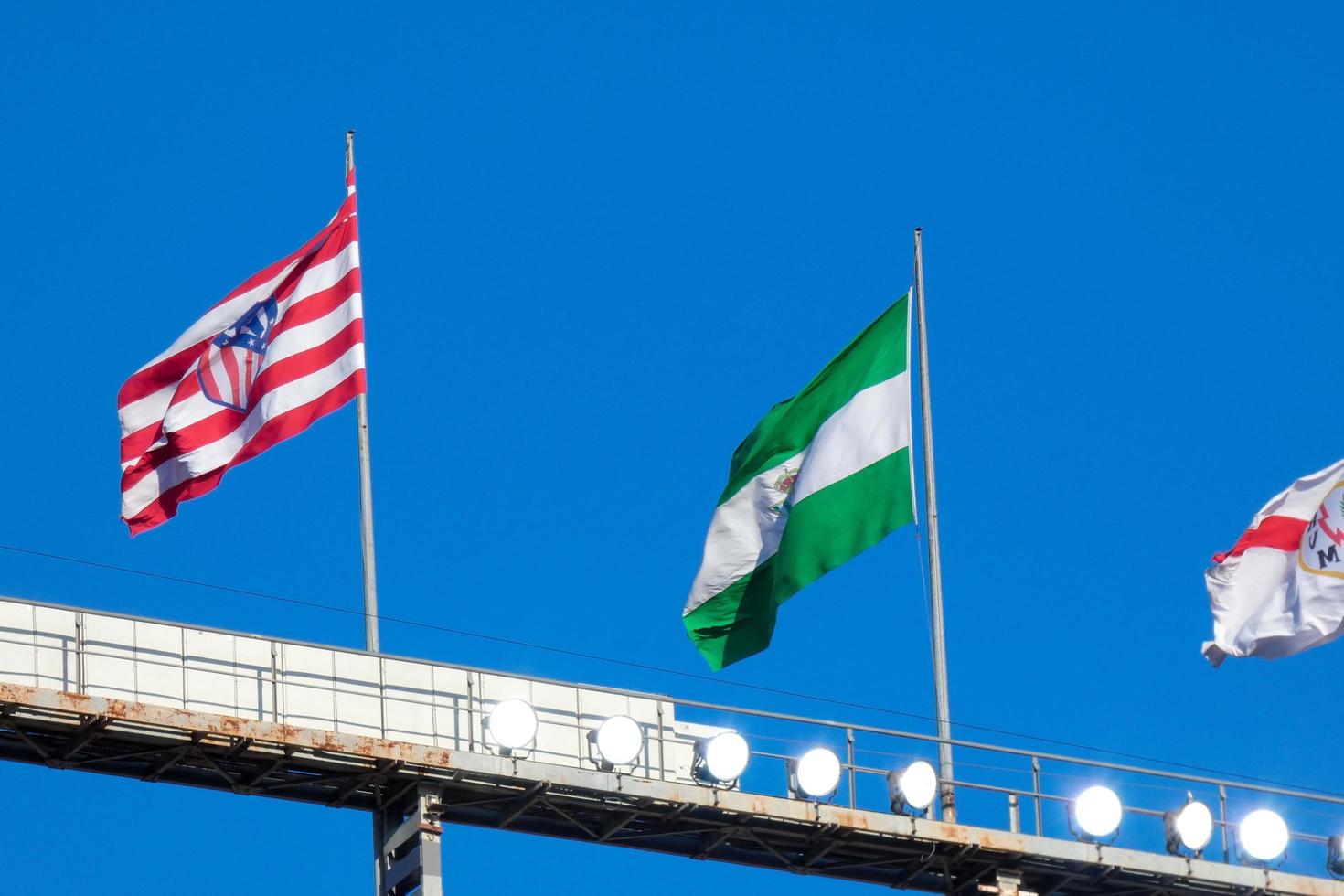 Flags of different countries and sports teams, flags with different coloured stripes. photo