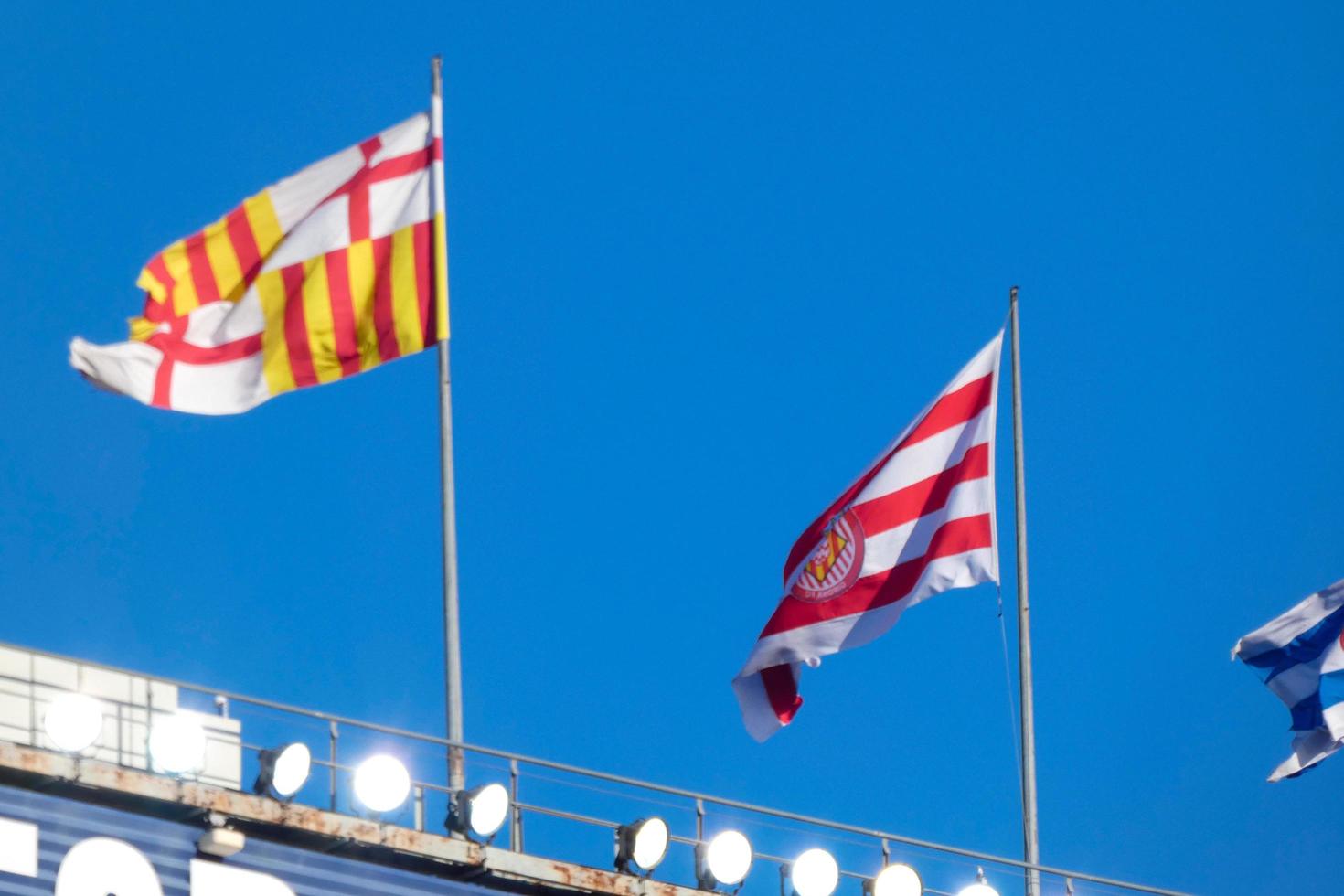 Flags of different countries and sports teams, flags with different coloured stripes. photo