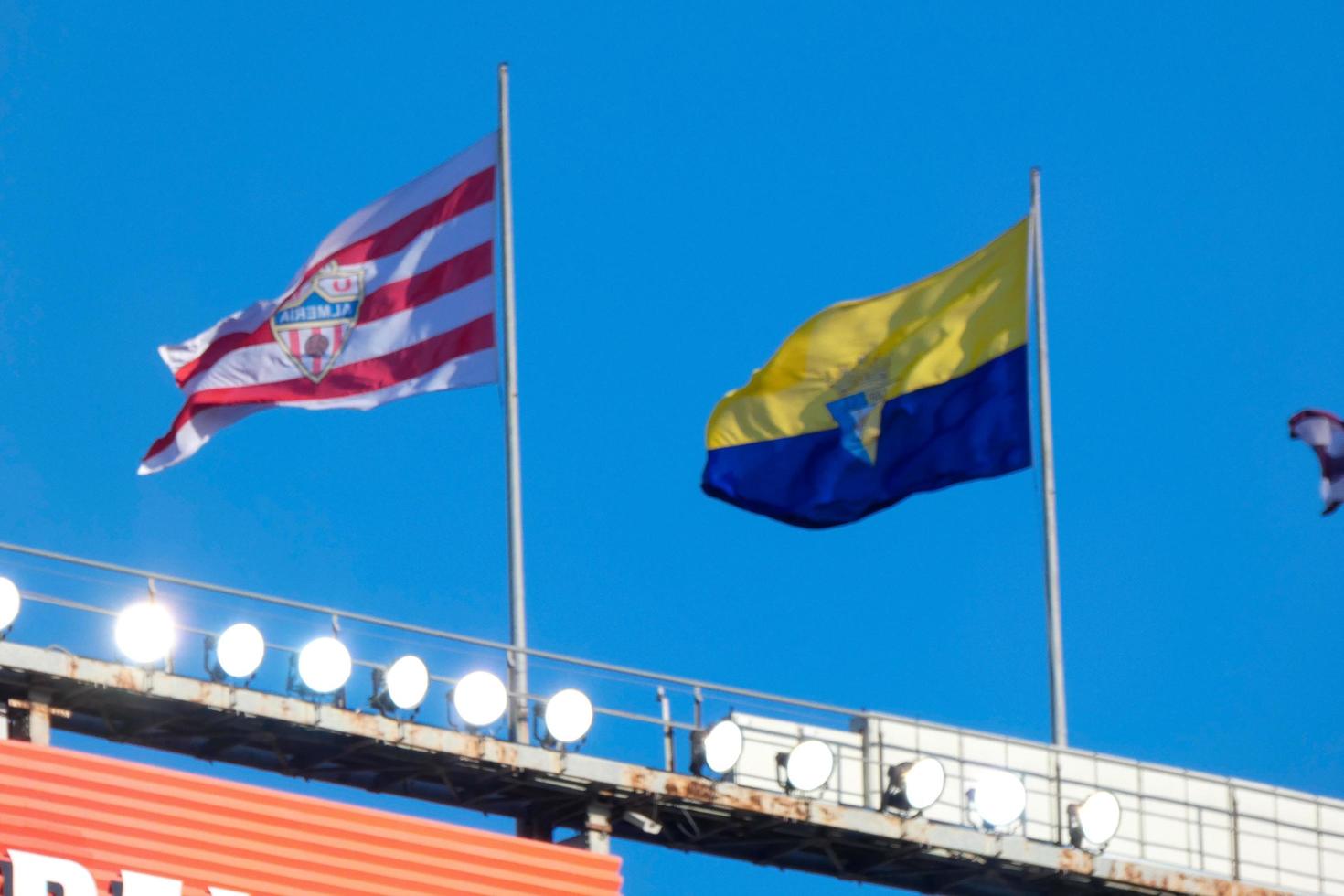 Flags of different countries and sports teams, flags with different coloured stripes. photo