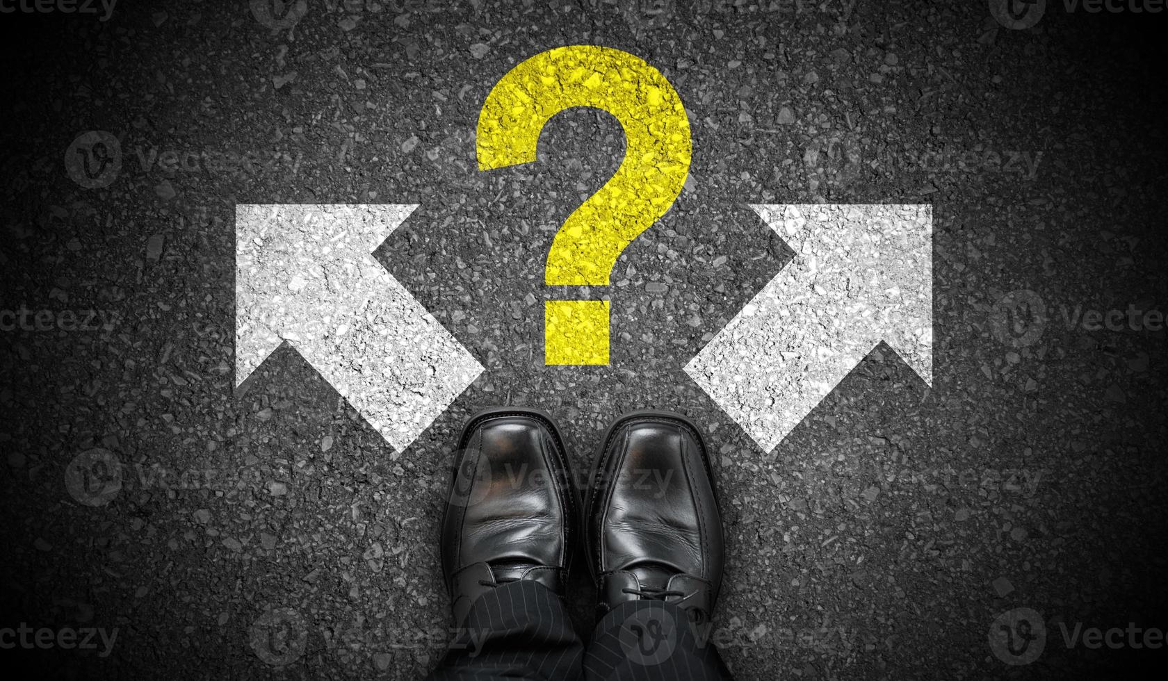 Black Business Shoes, Two Arrows and Question Mark - Problem Concept photo