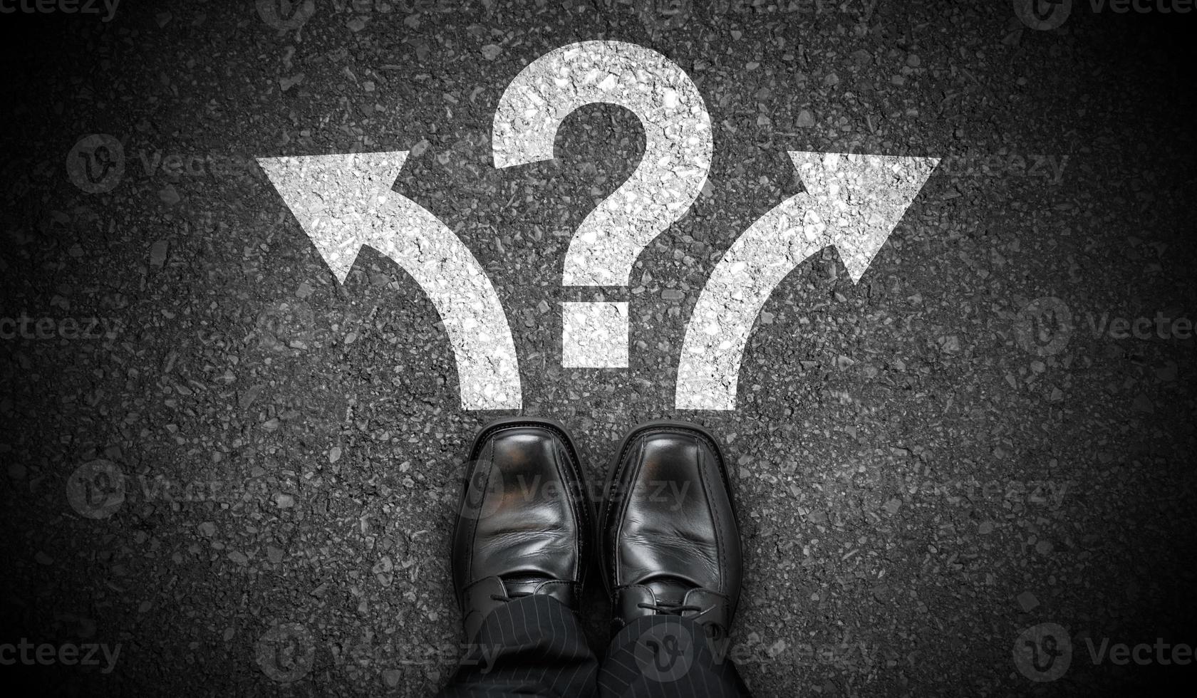 Black Business Shoes, Two Arrows and Question Mark - Problem Concept photo