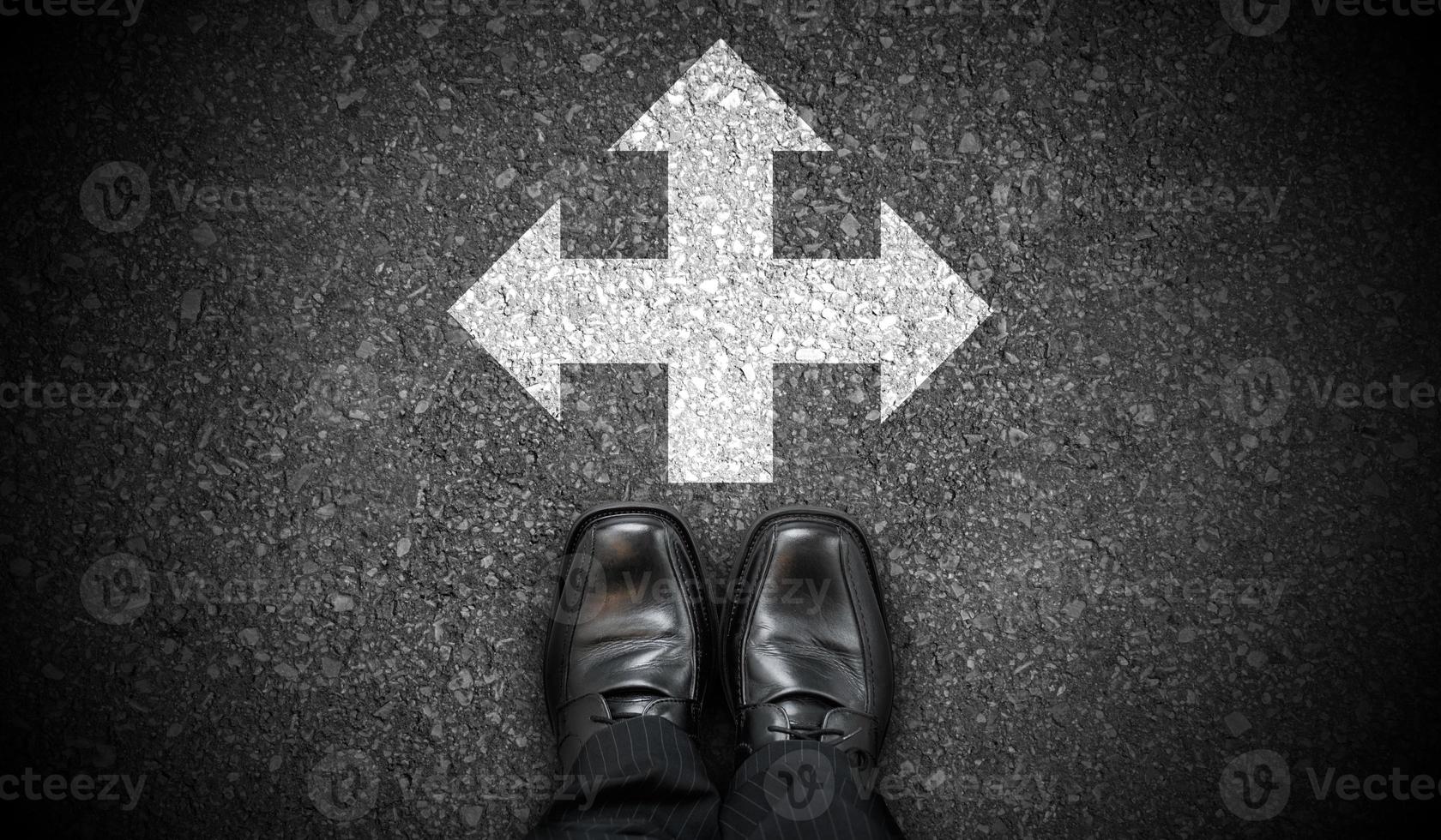 Black Business Shoes and Chalky Arrows in Three Directions on Asphalt - Choice Concept photo