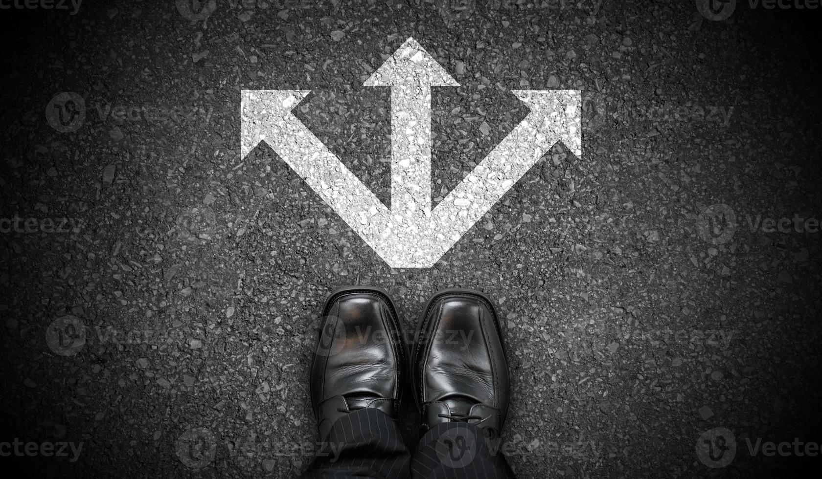 Black Business Shoes and Chalky Arrows on Asphalt - Choice Concept photo