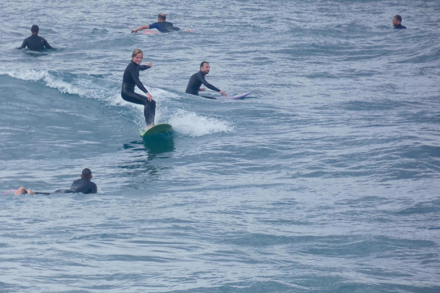 Surf school on an ocean beach photo