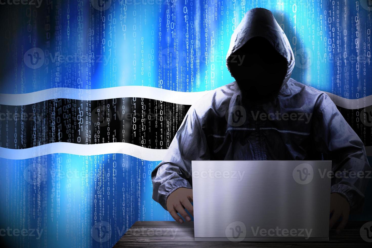 Anonymous Hooded Hacker and Flag Of Botswana, Binary Code - Cyber Attack Concept photo