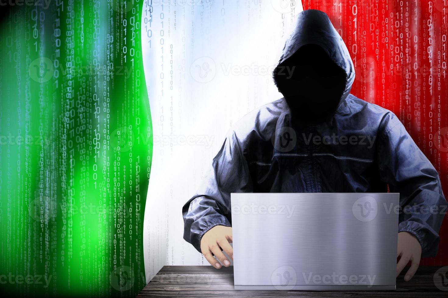 Anonymous Hooded Hacker and Flag Of Italy, Binary Code - Cyber Attack Concept photo