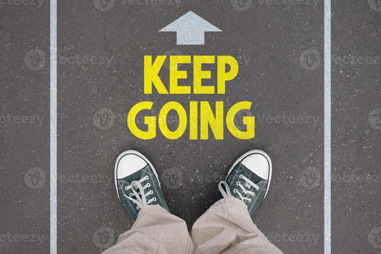Keep going - legs with trainer shoes photo