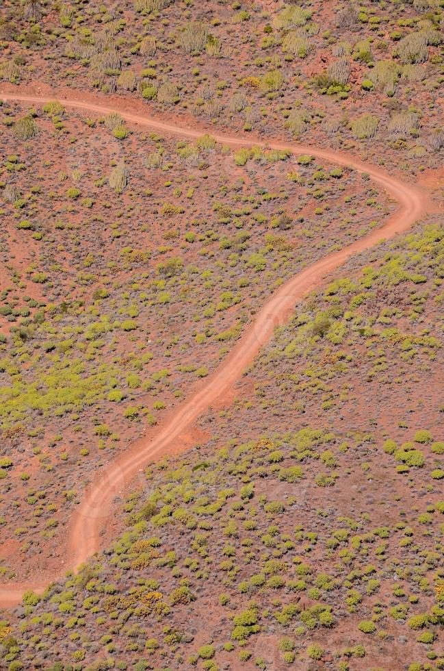 Road through the scenic landscape photo