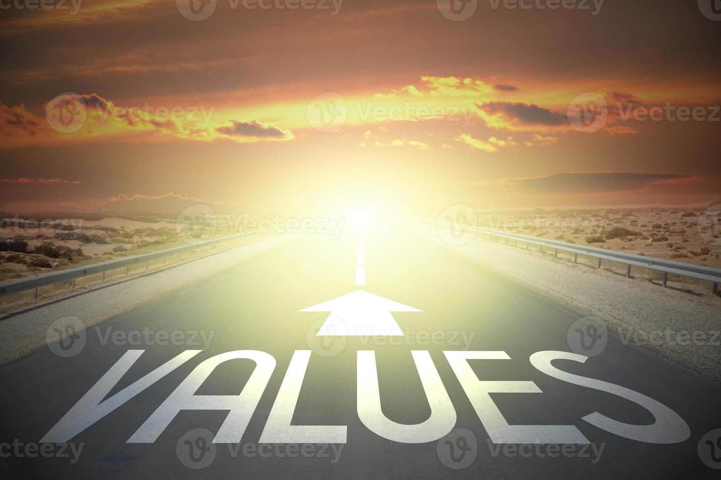 Values word on a road and sunset sky photo