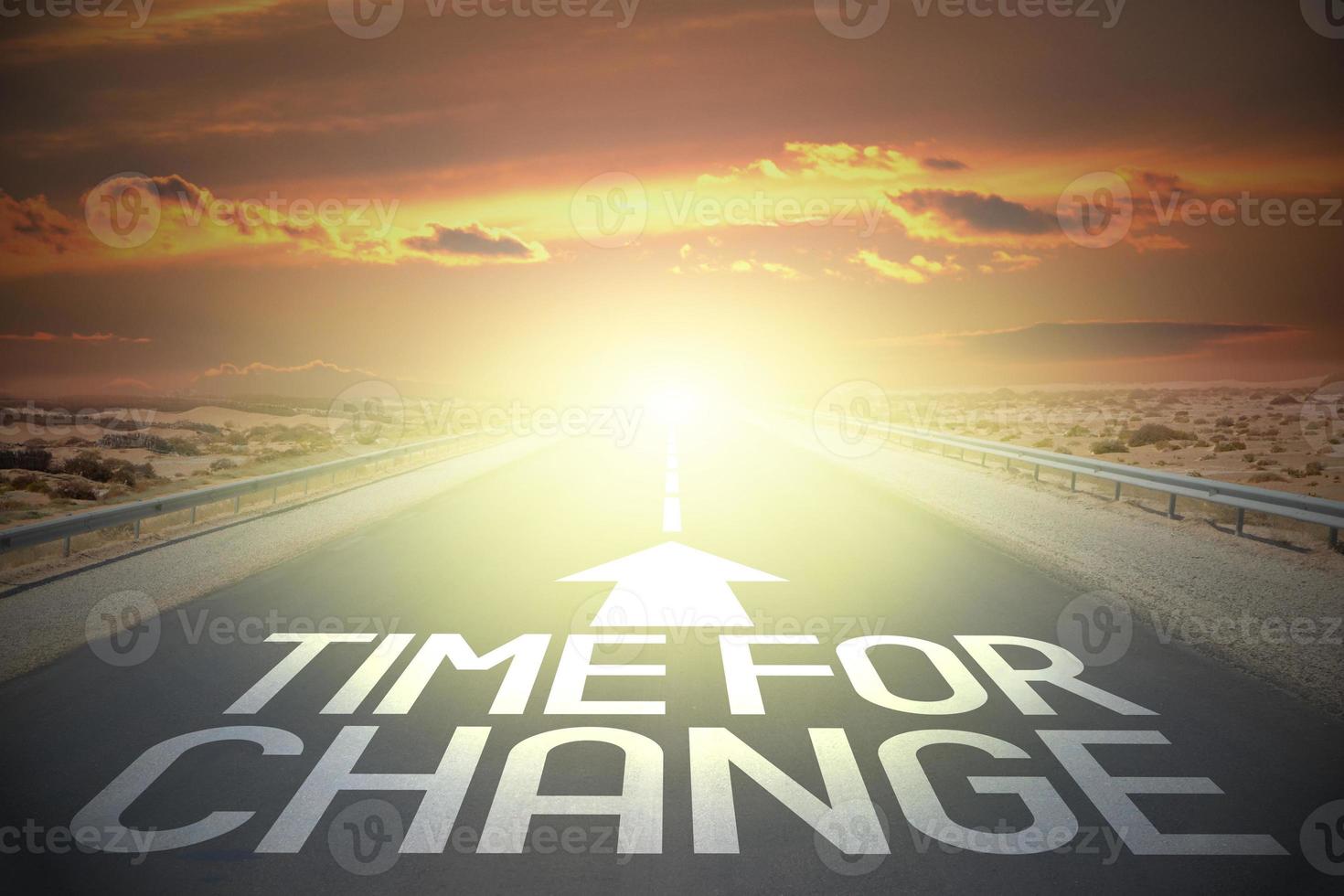 Time for change word on a road and sunset sky photo