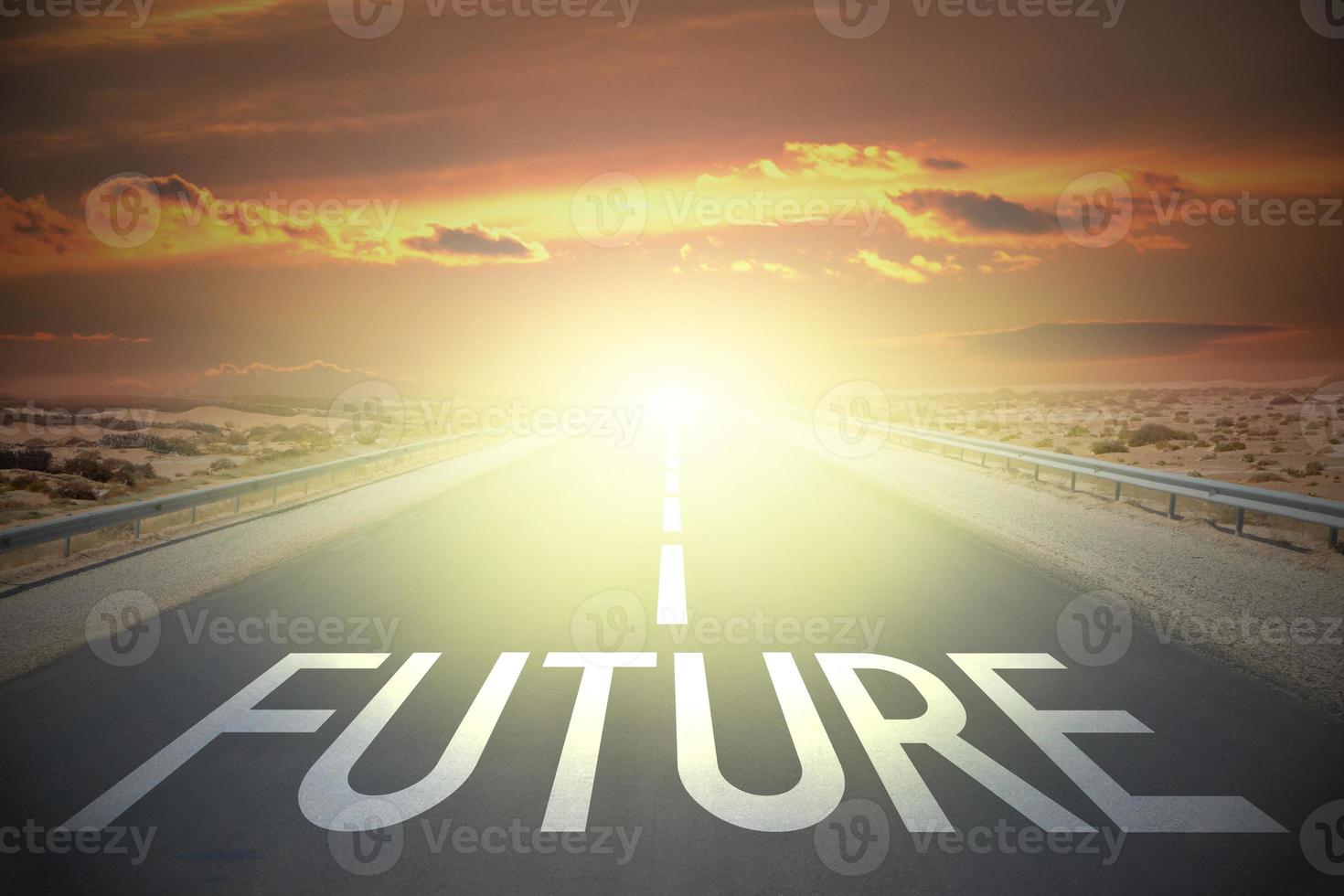 Future word on a road and sunset sky photo