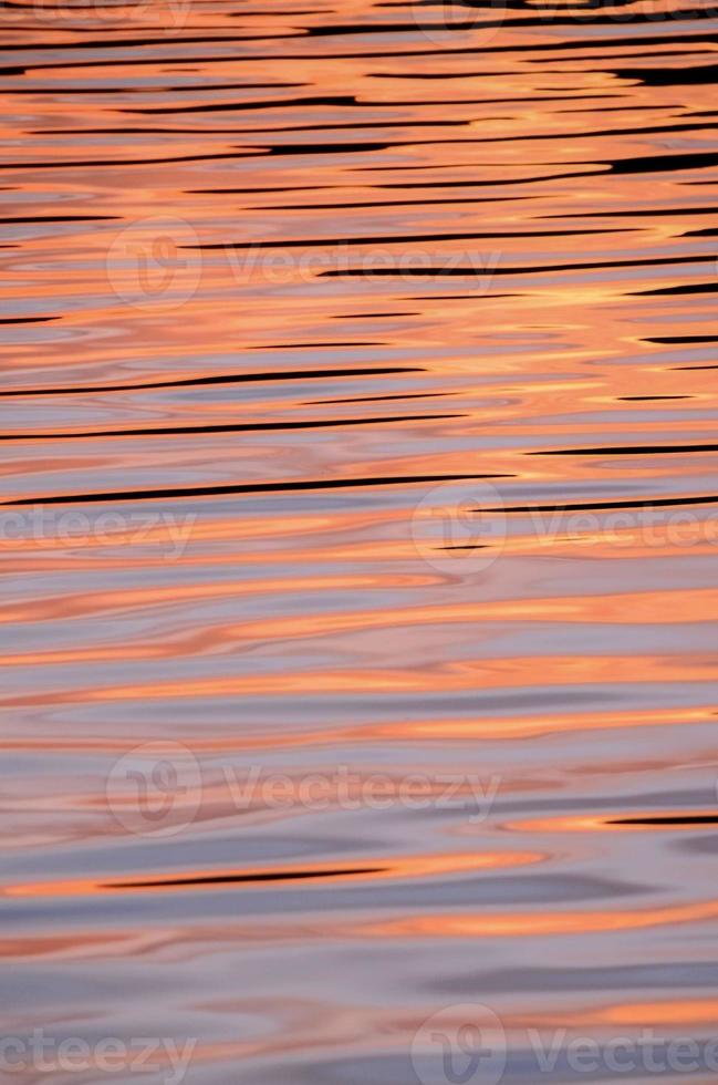 Sunset over the sea photo