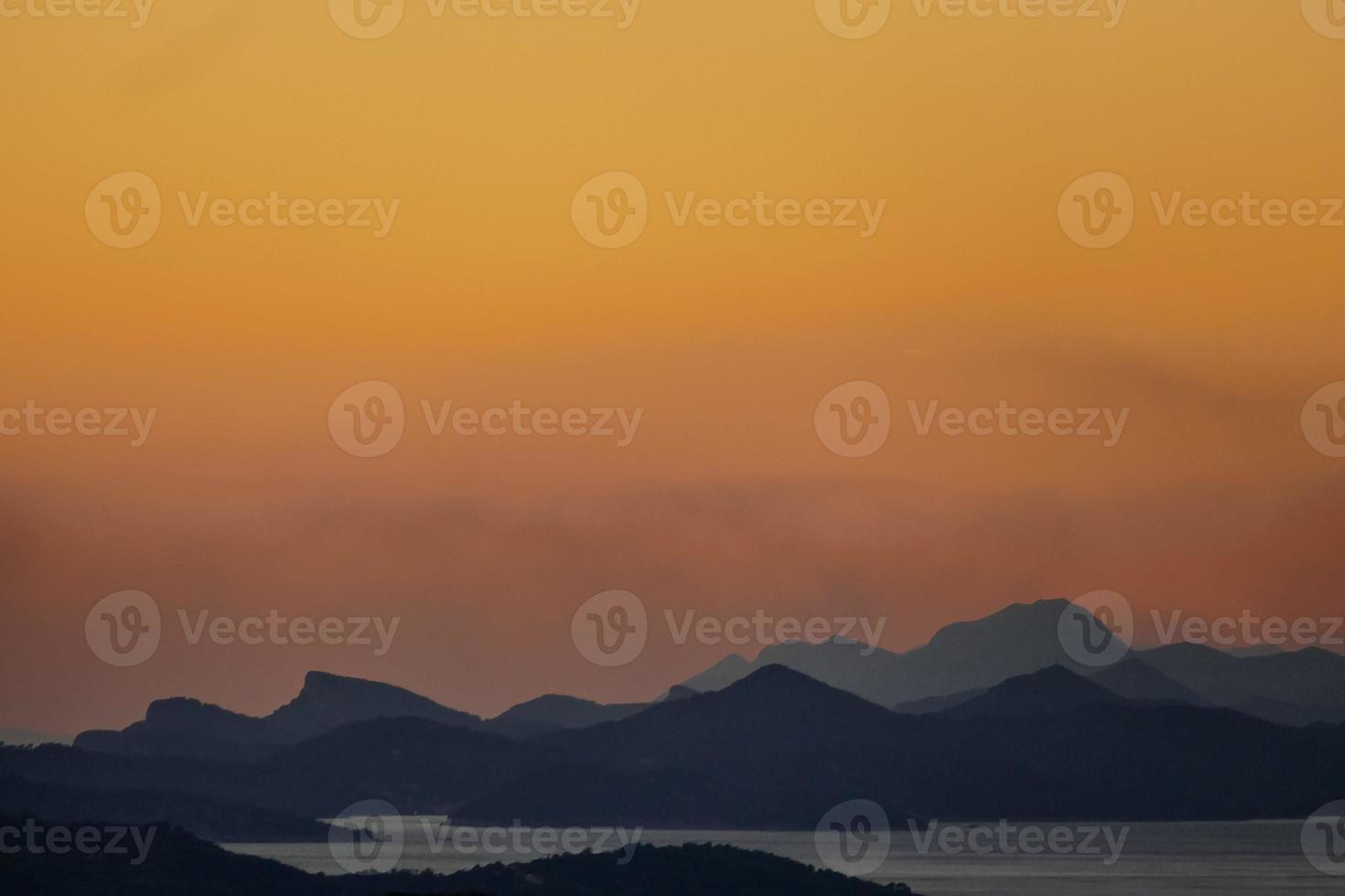 Sunset over the sea photo
