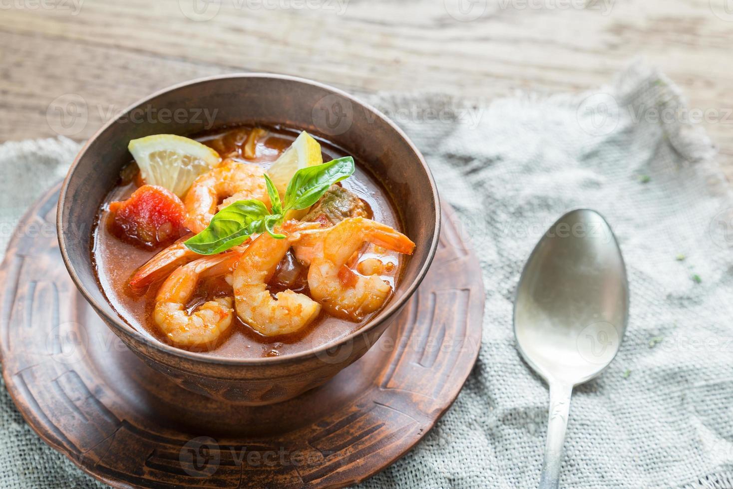 Spicy french soup with seafood photo