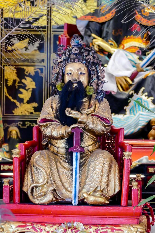 Buddhist sculptures in a temple in Bangkok, Thailand, circa May 2022 photo