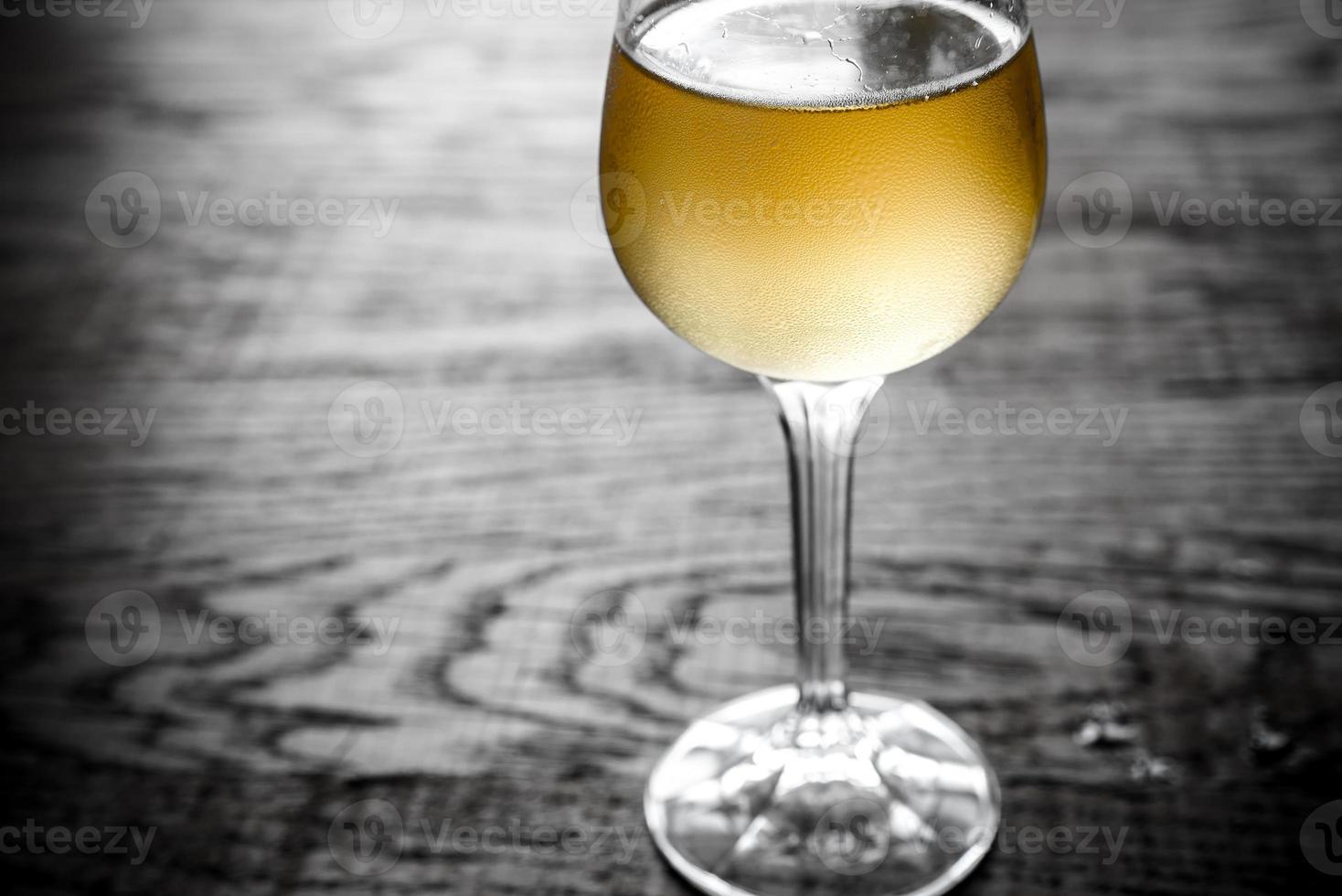 Glass of white wine photo