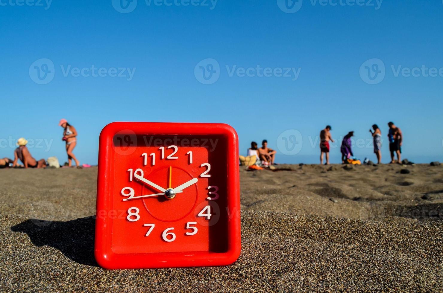 Clock in the sand photo