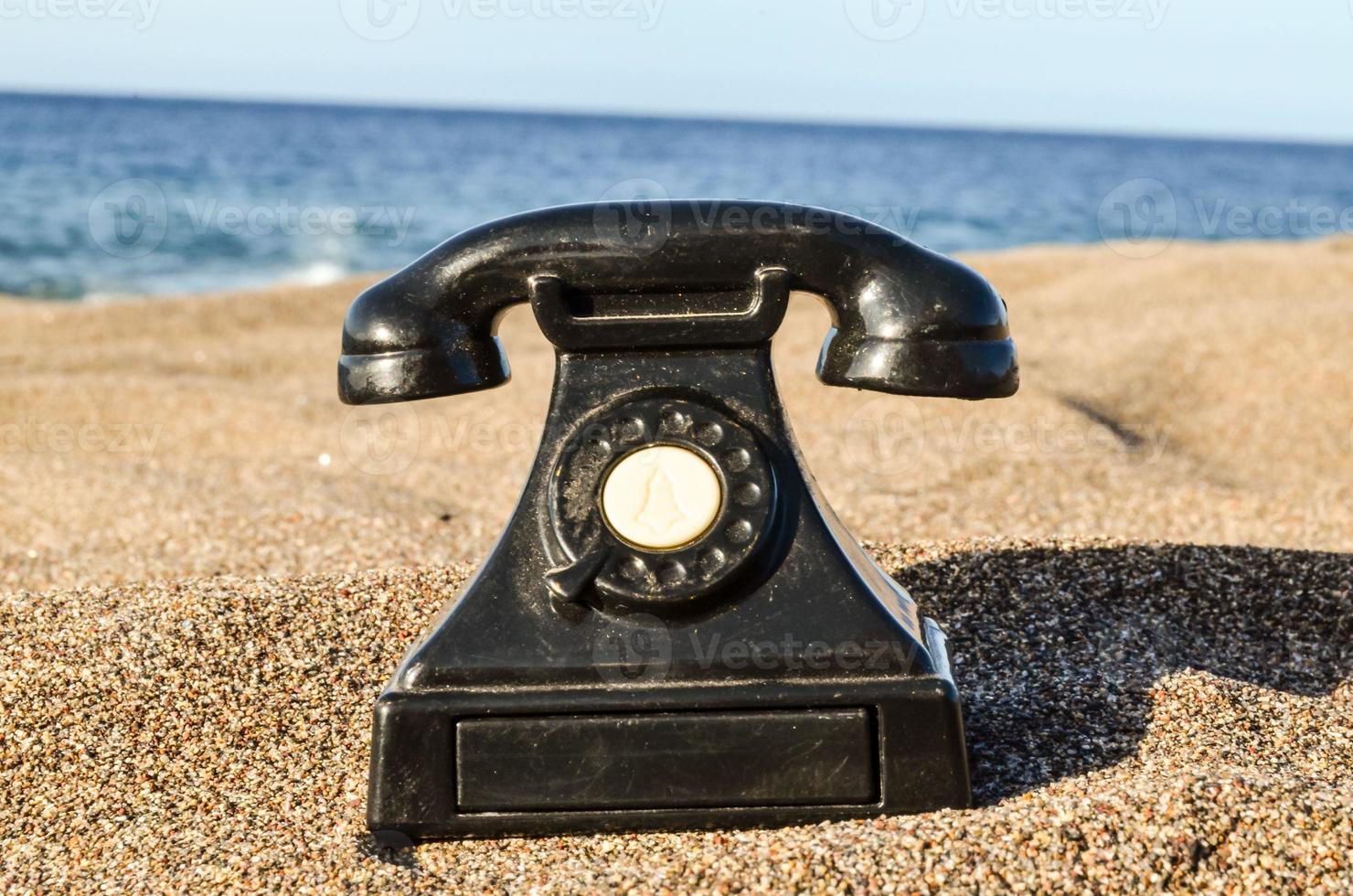 Phone in the sand photo