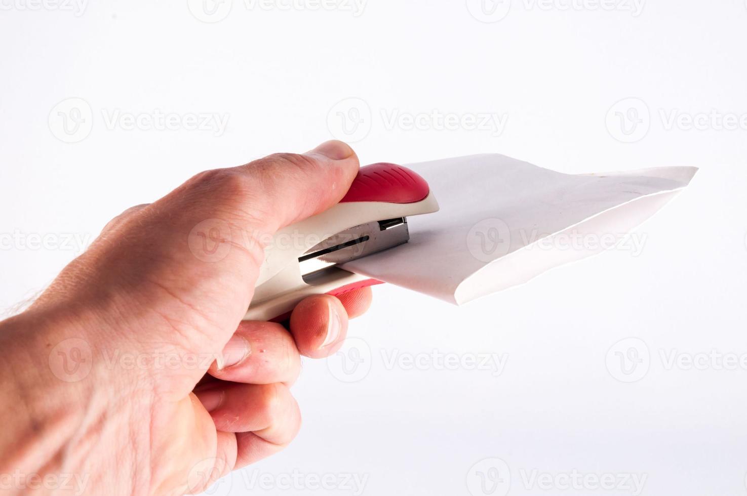 Stapler on light background photo