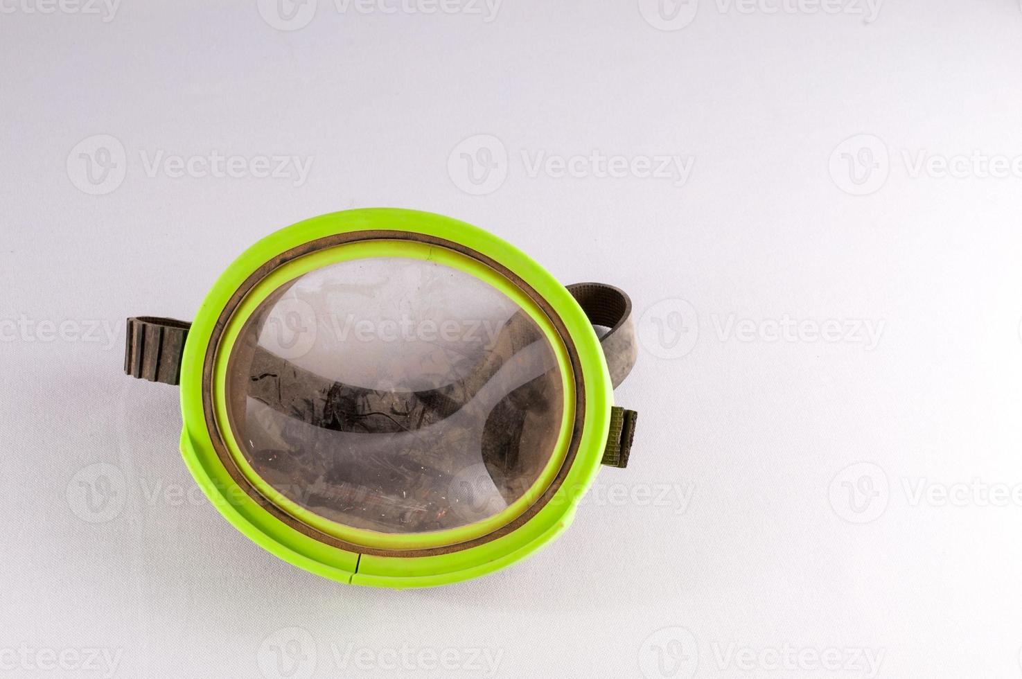 Goggles on light background photo