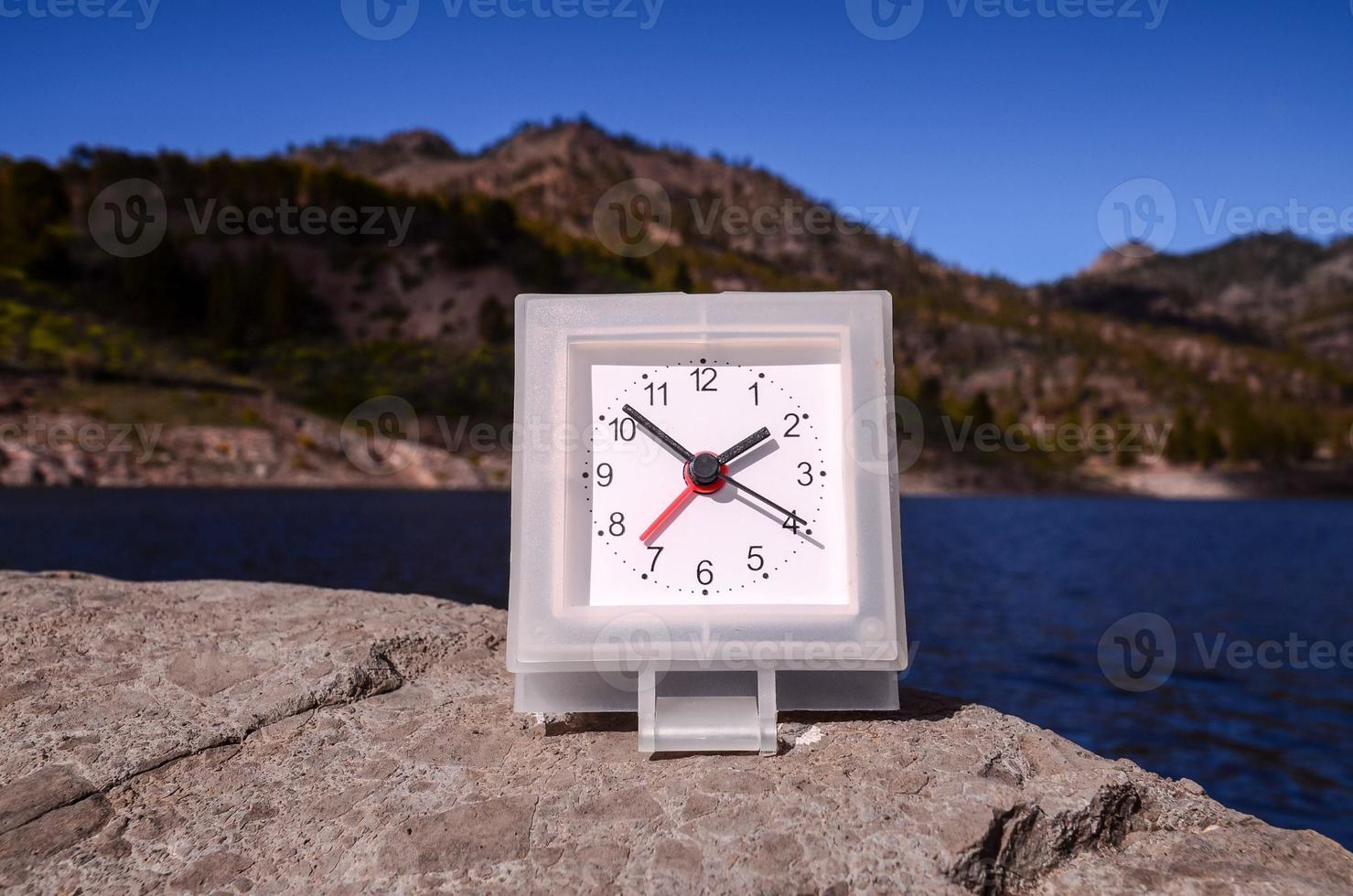 Clock on the rocks photo