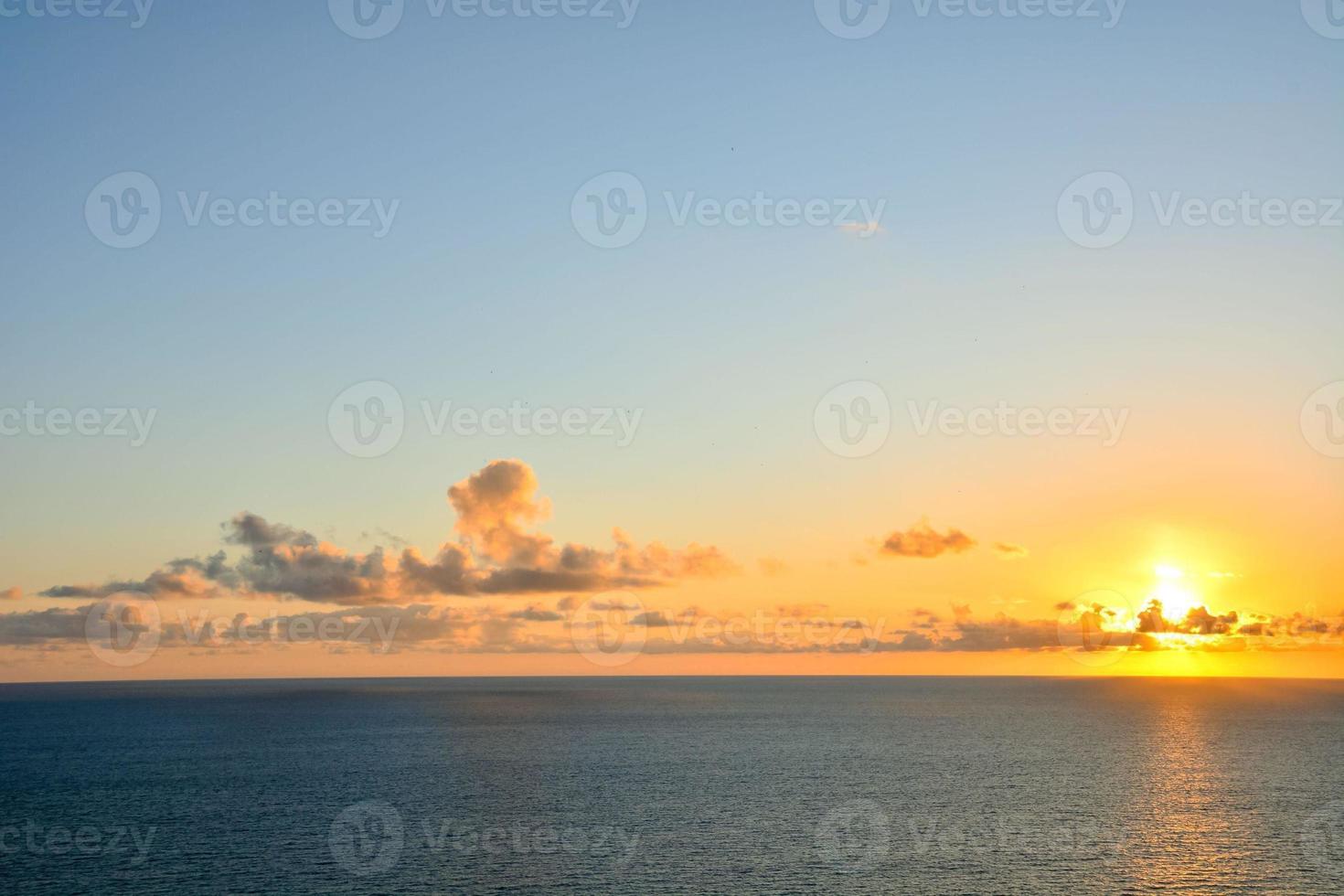 Sunset over the sea photo