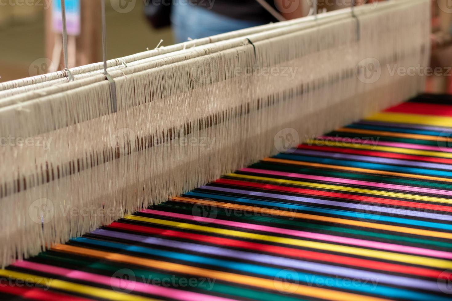 loom that prepared fibers for weaving work in ancient times weaved with natural fibers and is handicraft that is popular with people because weaving from natural fibers takes quite long time to weave. photo
