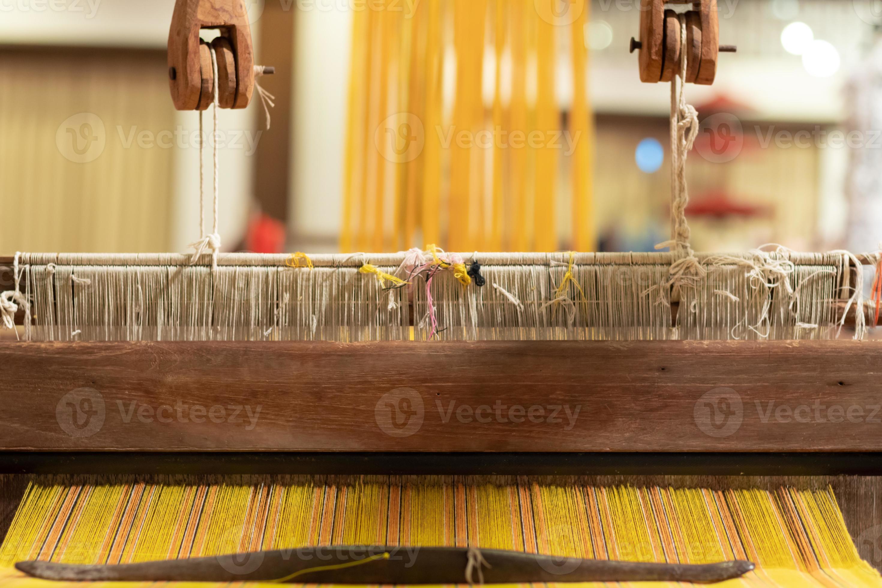 loom that prepared fibers for weaving work in ancient times weaved with