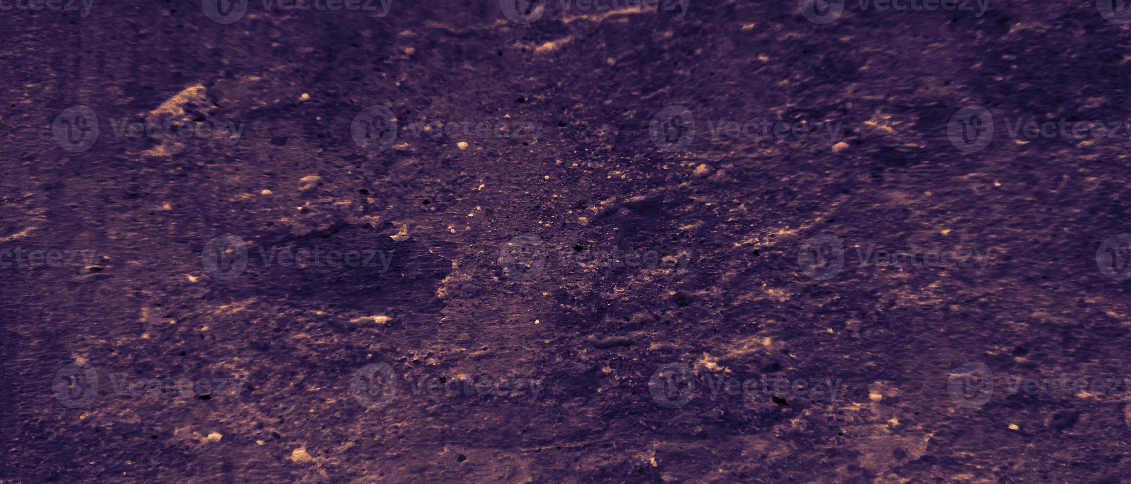 abstract cement wall with neon light on dark background. wall texture. Stone wall background. cement bricks wall. photo